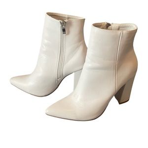 White pointed block healed booties she&in